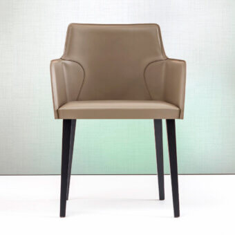 Distinguished Bross Ned armchair with high-end wood legs and premium tan leather upholstery crafted in Italy