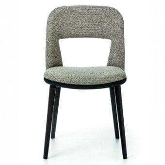 Distinctive Bross Path chair with rounded seat and cutout backrest upholstered in textured light and dark tones with dark stained wood structure