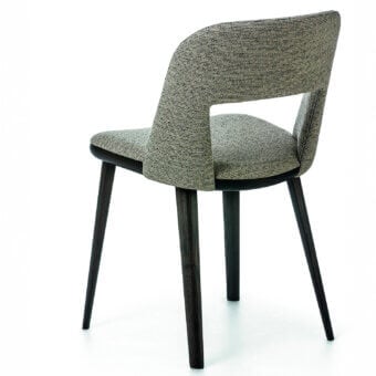 Luxury Bross Path chair with wood structure and upholstered seat crafted in mottled gray and cream fabric with a dark finish
