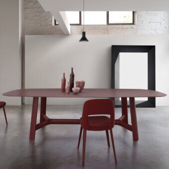 Elegant Bross River table crafted in premium wood with a dark reddish-brown matte finish and oval top