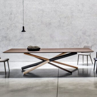Distinguished Bross W table crafted in American walnut beams with a metal tube in RAL 7016 and a smooth matte wood finish