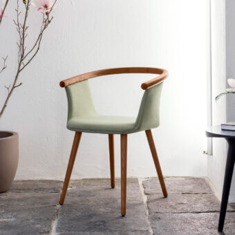 Exceptional Bross Yuumi armchair crafted with ashwood and light green premium fabric exhibiting a matte finish