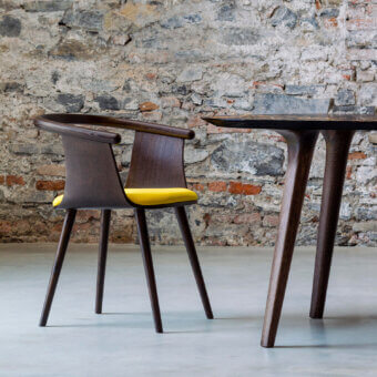 Harmonious Bross Yuumi armchair with vibrant yellow seat cover and high-end ashwood structure crafted in Italy