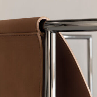 Elegant Cierre1972 Jamiro lounge chair in tan leather with “cuoio effect” finish and polished chrome-like metal frame