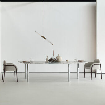 Superior Cierre1972 Adele armchair crafted in leather with slim metal trim mirroring seams for refined comfort