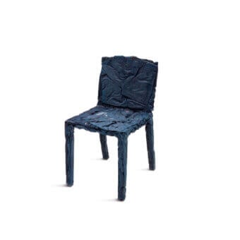 Superior Casamania Rememberme chair built in dark blue denim with a matte finish showcasing visible seams and pockets