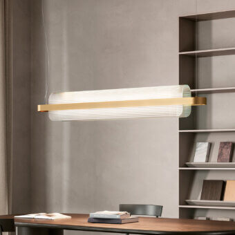 Distinguished Kundalini Nami suspension lamp with curved glass diffuser and metallic coated structure exhibiting continuous light refraction