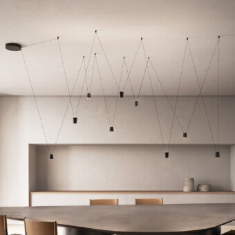 Superior Kundalini Sling suspension lamp with die-casted aluminum and thin black cables in a matte finish