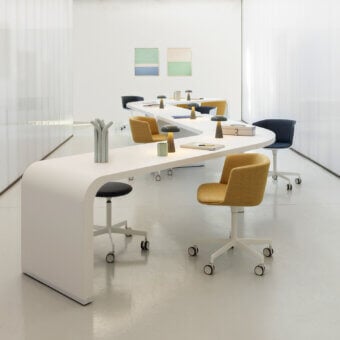 Exceptional Lapalma Brunch workstation presents a serpentine form with white laminate and powder-coated metal legs