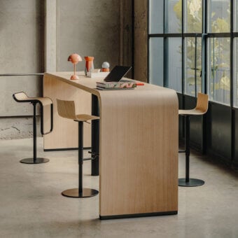Exceptional Lapalma Brunch workstation with a curved wooden top and sleek powder-coated black metal base exhibiting a smooth finish
