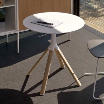 Elegant Lapalma Fork Bistrot table with a matte white HPL Fenix® top and aluminum legs in wood veneer