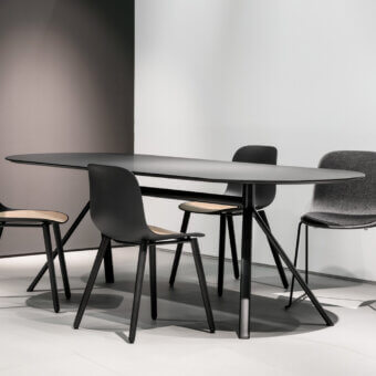 Sophisticated Lapalma Fork table with elongated oval top and dark matte-finish wood-veneered aluminum legs