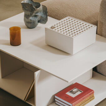 Elegant Lapalma Plus side table in white matte Fenix® HPL with intersecting planes creating open shelving spaces