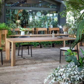 Superior Miniforms Manero table crafted in Italy with natural wood and matte finish emphasizing grain