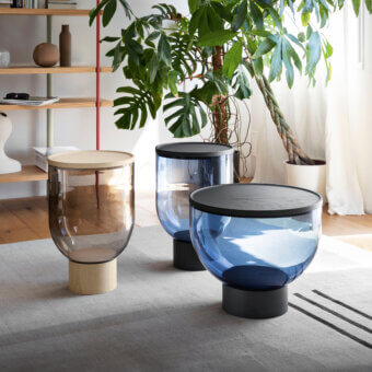 Captivating Miniforms Mastea coffee table with blue-tinted cylindrical glass and dark wood crafted in Italy