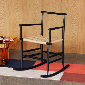 Exceptional Miniforms Pelleossa rocking chair with light tan woven seat and black matte wood frame
