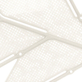 White geometric panel with circular perforations and raised linear segments forming an angular, leaf-like pattern; modern architectural element.