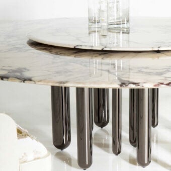 Distinguished Casa Casati Discoteca table with glossy grey veined marble and dark bronze tubular brass legs crafted in Italy
