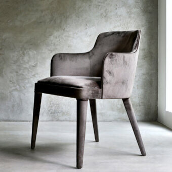 Exclusive Casa Casati Lola chair upholstered in muted gray-brown fabric with shaped polyurethane and slender beech wood legs