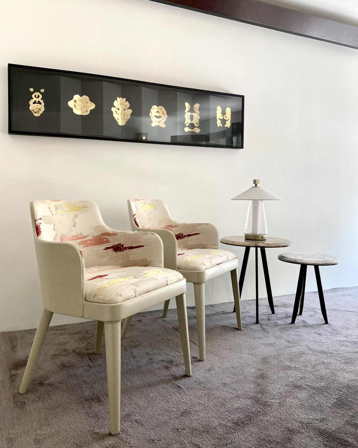 Exceptional Casa Casati Lola Royale chair built with beech wood fully enveloped in supple leather and luxury fabric displaying ivory, red, yellow hues
