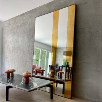 Refined Casa Casati Strip mirror with alternating Antique Gold and clear mirror panels in a Dark Bronze finished metal frame