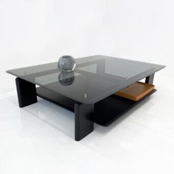 Harmonious Casa Casati Toro coffee table crafted with solid ash wood, a brown leather tray, and transparent tempered glass top