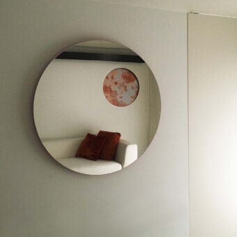 Distinguished Casa Casati Transito mirror crafted with light bronze lacquered MDF and a matte finish, presenting a signature matt orange back panel