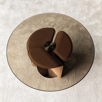 Avant-garde Cierre1972 Helix coffee table with a warm brown helix base and clear glass top