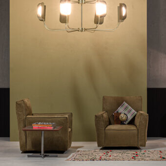 Distinguished Cierre1972 Season lounge chair with brown textile upholstery and matte finish creating a modern geometric silhouette