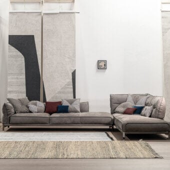 Superior Cierre1972 Up-Down sectional in matte gray textile with plush cushions and thin metal legs