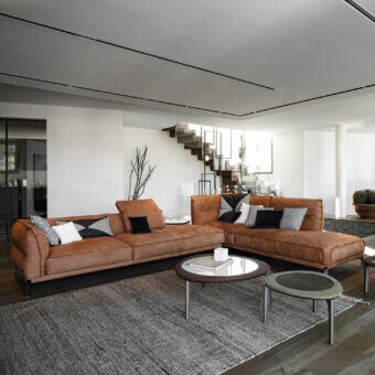 Distinguished Cierre1972 Up-Down sectional in brown textile with matte finish and raw-cut edges exhibiting elegant design details