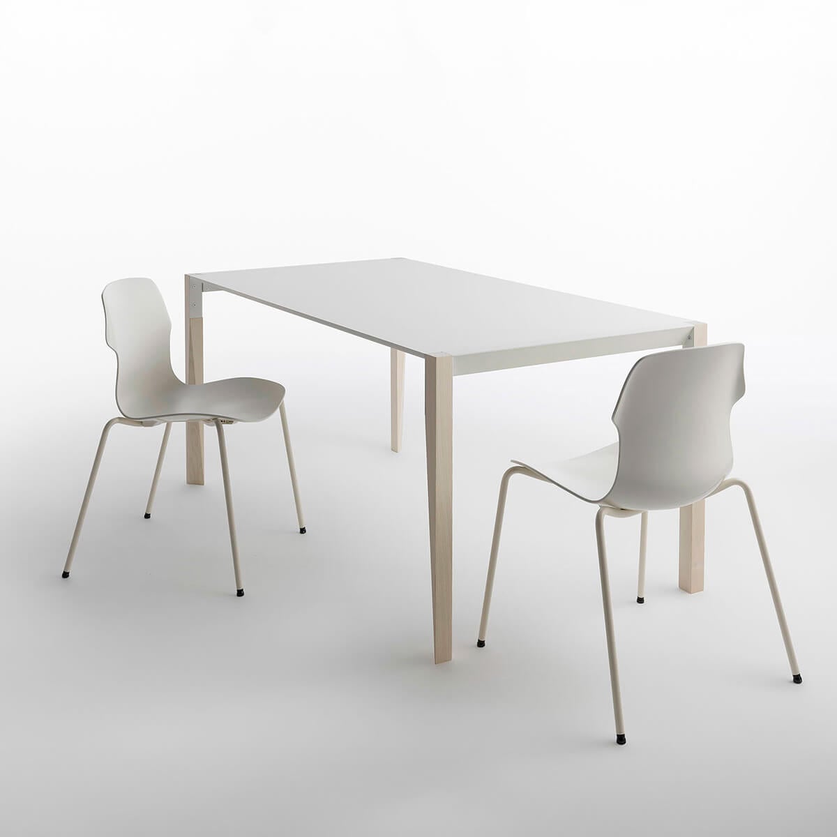 Exclusive Casamania Stereo chair built in Italy with smooth matte white synthetic seat and matching metal legs