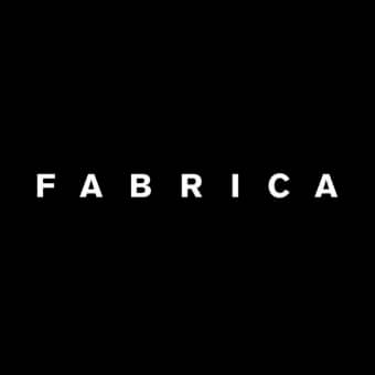 Minimalist typography displays "FABRICA" in white, sans-serif capital letters centered on a solid black background, emphasizing brand identity.