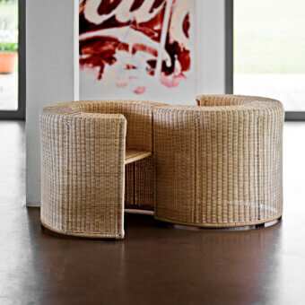 Distinguished Horm Charlotte lounge chair with light tan handwoven natural wicker and textured matte finish