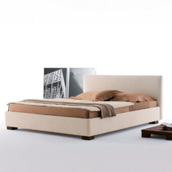 Elegant Horm Lipari bed with light beige textile upholstery and solid beechwood feet in mocha lacquer finish