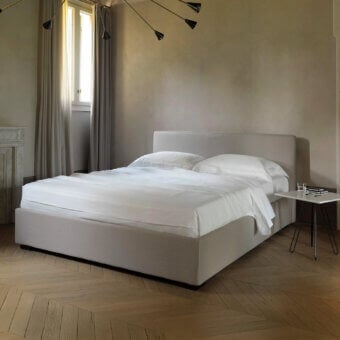 Superior Horm Lipari Plus bed in light grey textile with solid beechwood feet and mocha lacquer finish