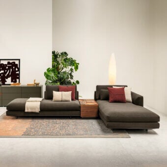 Distinguished Horm Miles sectional with a low profile, dark neutral upholstery and light aluminum frame built with Italian tailoring