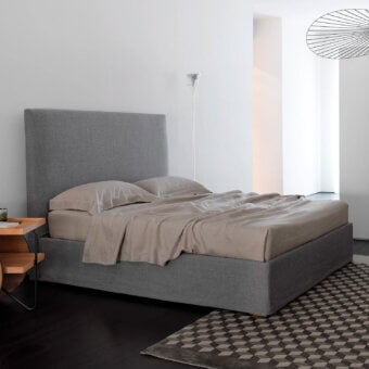 Exceptional Horm Panarea bed with soft gray textile upholstery and mocha lacquered solid beechwood feet