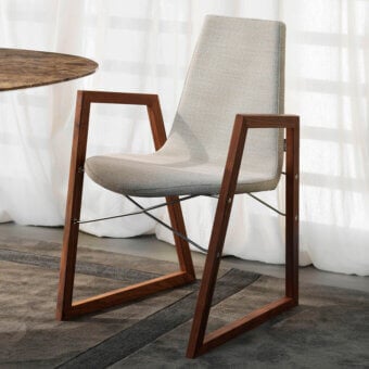 Superior Horm Ray armchair with light gray premium fabric upholstery and a solid wood frame built with chrome-plated steel cross-bars