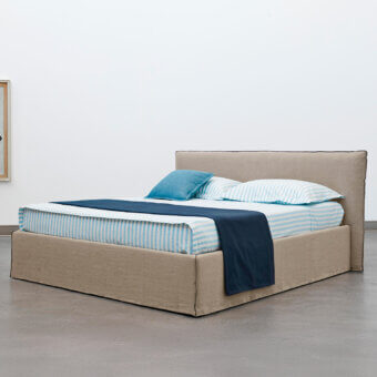 Superior Horm Tahiti bed with light beige textile upholstery and mocha lacquered solid beechwood feet