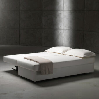 Exceptional Horm Vulcano sofabed with white removable fabric upholstery and a balanced transforming mechanism