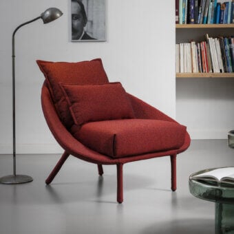 Exceptional Miniforms Lem lounge chair upholstered in reddish-brown textured textile with a tubular structure and slender legs