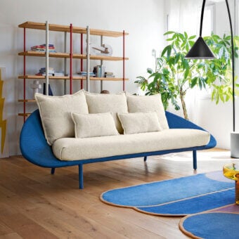 Captivating Miniforms Lem sofa with blue net-patterned fabric and comfortable off-white cushions against a tubular structure