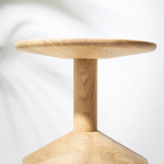 Distinguished Miniforms Pezzo stool crafted from solid oak with a smooth natural wood tone and matte finish