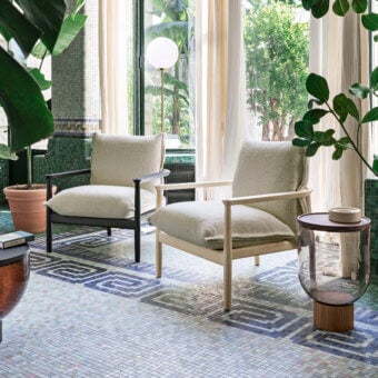 Exceptional Miniforms Sergia lounge chair with light-toned wood and thick, textured cushion offering a clean aesthetic