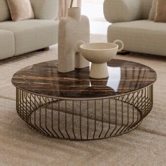 Exclusive Bontempi Circus coffee table with a dark brown and gold marbled SuperMarble top built with gold-finished tubular metal rods