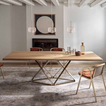 Distinguished Bontempi Delta table with light-toned wood and geometric brass-like metal base crafted in Italy