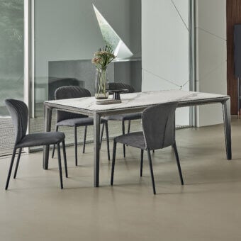 Sophisticated Bontempi Duke table with grey veined surface and sleek dark grey matte metal frame legs