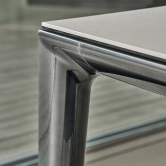 Superior Bontempi Duke table with light gray or off-white tabletop and dark metallic gray leg in glossy finish