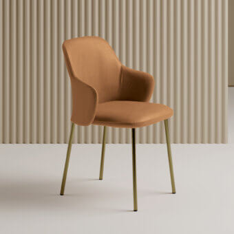 Superior Bontempi Vivian armchair with curved silhouette and warm tan upholstery in matte finish with gold lacquered steel legs
